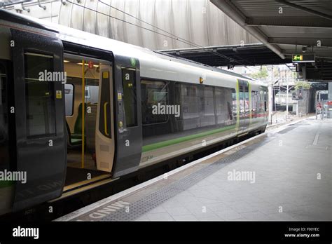 london midland train on the platform at birmingham new street station ...