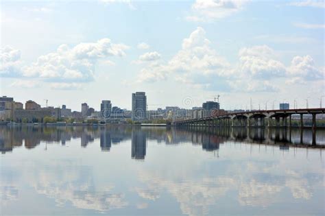 ?ity of Dnipro, a Metropolis with Skyscrapers, Houses, Bridges, Green Trees Standing on the ...