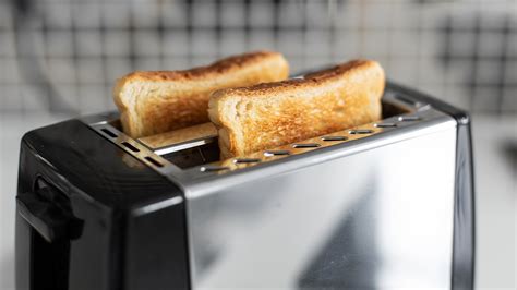 How to Clean a Toaster to Remove Crumbs & Stains - First For Women