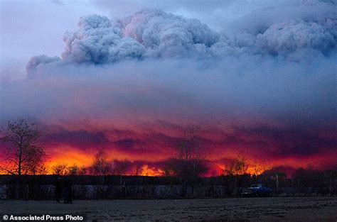 Canada wildfire footage of Alberta couple watching their home go up in ...