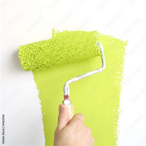 painting a wall in lime green Stock Photo | Adobe Stock