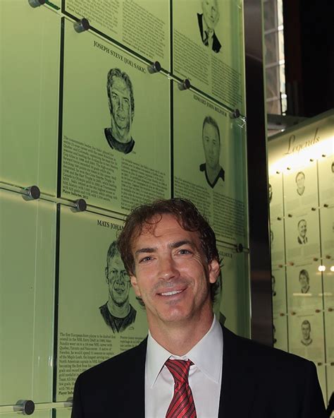 Joe Sakic poses by his Hall of Fame plaque following a photo ...