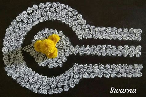 Inspired from Divesh Vara pic of Shivling with parijatha flowers | Flower art, Flower rangoli ...