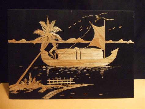 Genuine Rice Straw Art of Balangay Boat Near Land