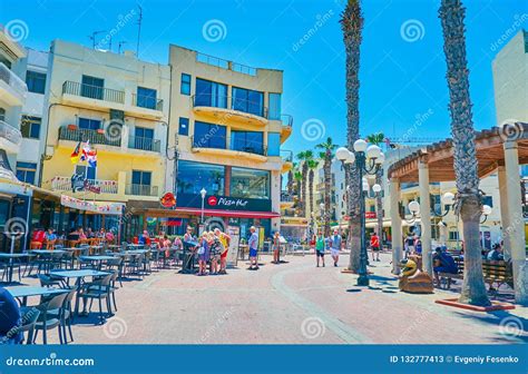 The Main Shopping and Gourmet Area of Bugibba Editorial Stock Photo - Image of bench, coast ...