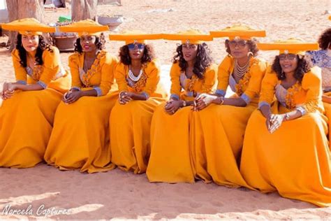 Clipkulture | Beautiful Ladies In Yellow Herero Traditional Dresses and Headdress