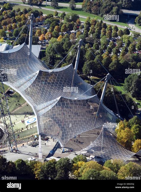 The famous roof of the Munich Olympic stadium designed by Behnisch and Frei Otto Stock Photo - Alamy