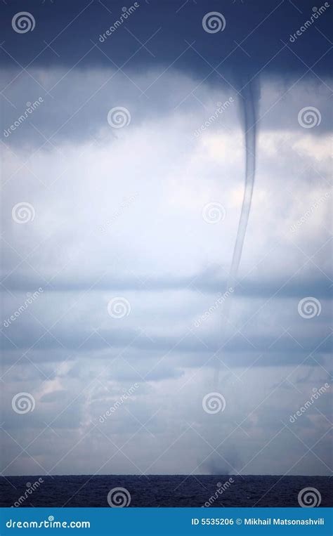 Tornado and storm clouds stock photo. Image of cyclone - 5535206