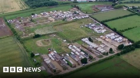 Smithy Fen travellers site: Fines for planning breaches - BBC News