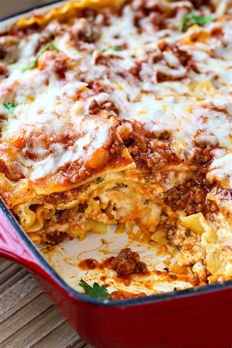 This Classic Beef Lasagna is the only lasagna recipe you'll ever need! It comes out perfect ev ...