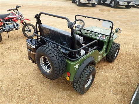 GAS POWERED JEEP THEMED GO CART - J.M. Wood Auction Company, Inc.