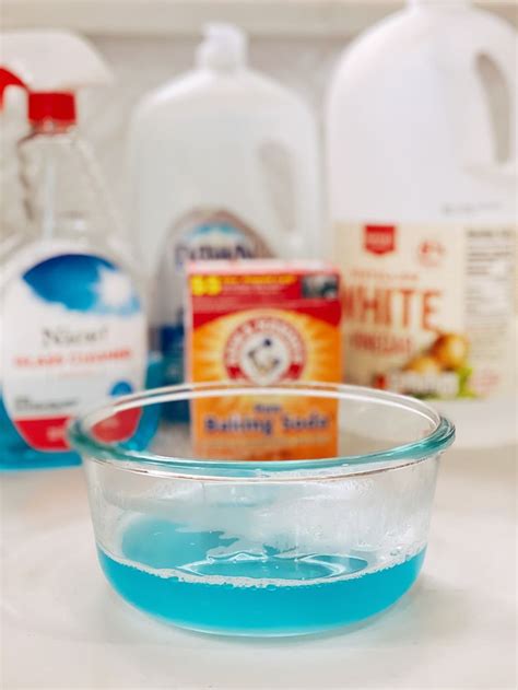 blue liquid is in a bowl on the counter