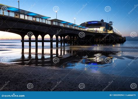 Bournemouth Pier, UK, Photographed from the Beach, in Low Light Early ...