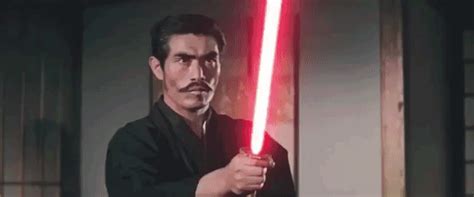 Bruce Lee Battles His Enemy With Lightsaber Nunchucks in a Recreated ...