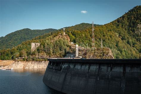 Dam Over the Arges River Surrounded by Lush Green Mountain Forests in ...