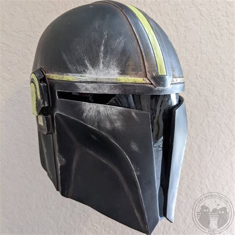 Made a battle damaged Mandalorian helmet : r/Mandalorian