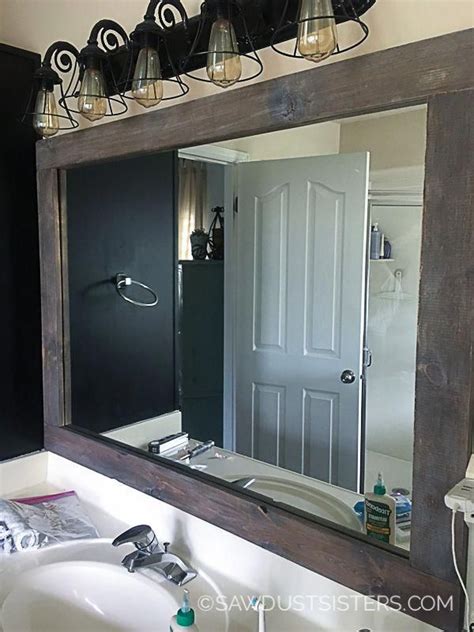 DIY Stick-On Mirror Frame | Bathroom mirrors diy, Bathroom mirror makeover, Diy mirror frame ...