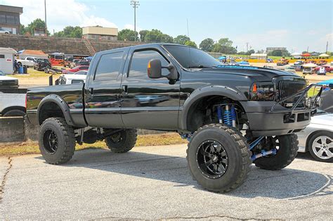 Lifted Ford Truck. www.CustomTruckPartsInc.com is one of the largest Truck accessories retailer ...