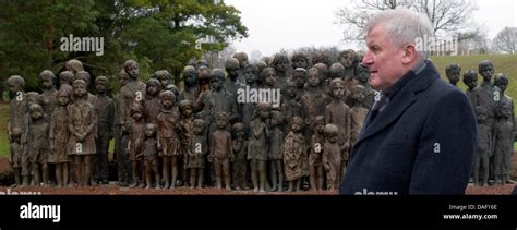 Premier of Bavaria Horst Seehofer stands in monument for the murdered children in Lidice ...