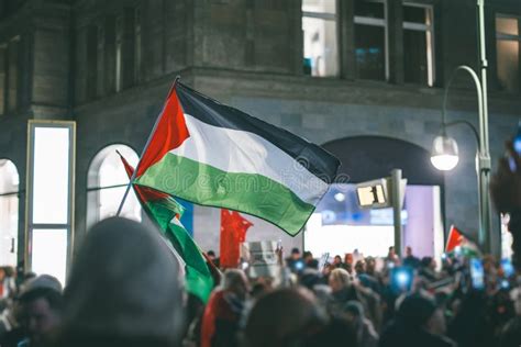 Pro - Palestinian Protests in Berlin. Flags of Palestine Waving between ...