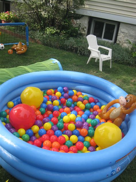 Need an easy activity for the kiddies? Fill your kid pool with plastic balls for a ball pit ...