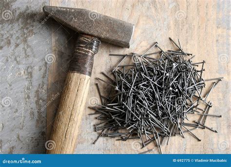 A hammer and nail stock image. Image of home, strong, whack - 692775