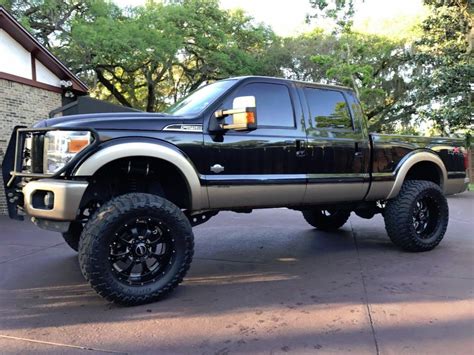 Awesome 2011 Ford F 250 King Ranch Crew Cab lifted for sale