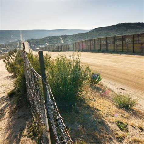 US/Mexico Border Fence stock image. Image of immigration - 19733747