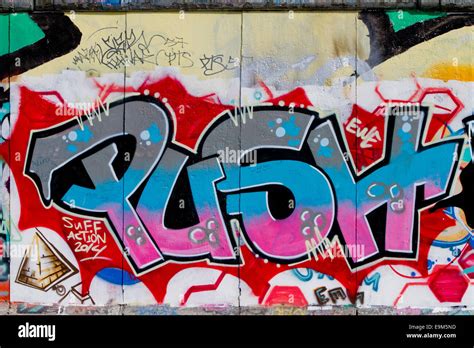 Berlin Wall Graffiti Tags colourful push scribbles Stock Photo - Alamy