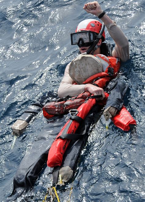 File:US Navy 120124-N-ZF681-155 Search and rescue swimmer Ensign Gregory Reichel, assigned to ...