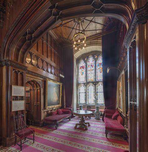 an ornate room with stained glass windows and wood paneling on the ...