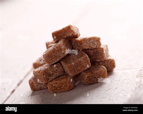 Brown sugar cubes Stock Photo - Alamy