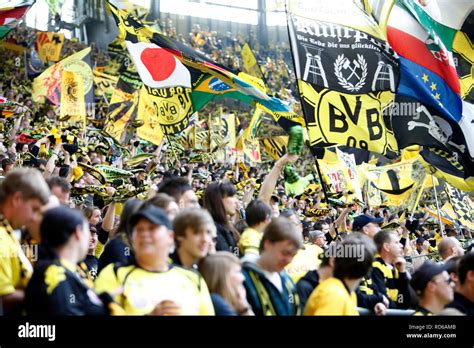 Fans of BVB Borussia Dortmund 09 football club on the south stand ...