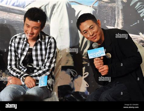 Actor Jet Li (R) attends a press conference for his new movie 'Ocean ...