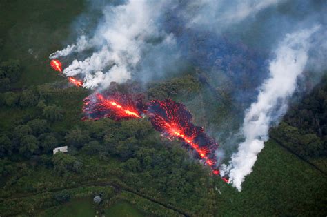 Huge fissures open on Hawaiian volcano, some defy evacuation order