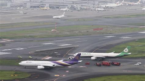 Plane collision at Japan’s capital airport, Haneda – Wayarc Daily