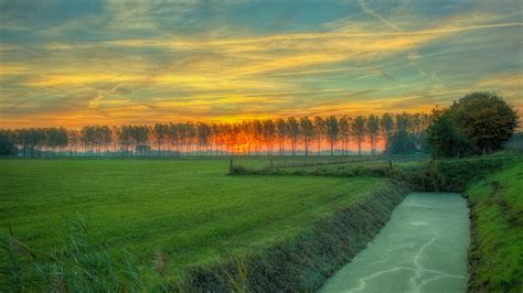 Sunrise at small village by Witoldhippie on DeviantArt