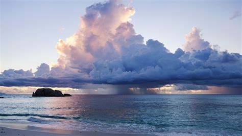 Storm clouds at sunset over the ocean, Seychelles, Africa | Windows Spotlight Images