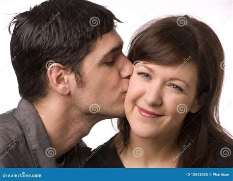 Kiss On The Cheek Royalty Free Stock Photo - Image: 12643425