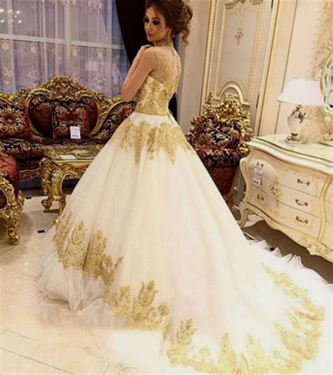 White And Gold Wedding Gowns | Gold wedding gowns, Ball gowns wedding ...