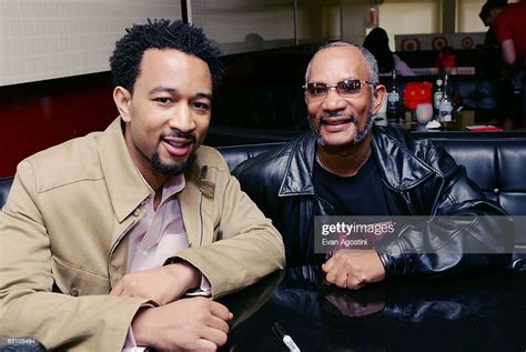 Singer John Legend poses with his father Ronald Stephens during an ...