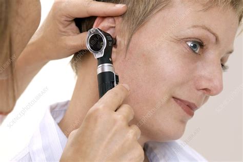 Ear examination - Stock Image - M920/1584 - Science Photo Library