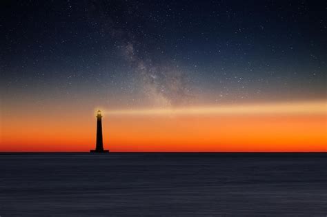 Premium Photo | Lighthouse against night sky