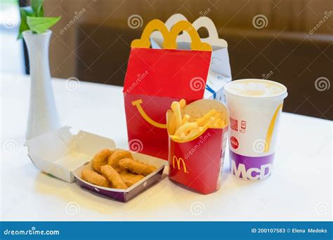 Happy Meal Menu at McDonald`s Restaurant. Happy Meal Kids Next To ...