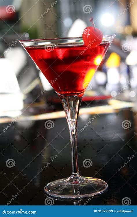 Pink Martini Cocktail in a Bar Stock Image - Image of cranberry, closeup: 31379539