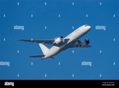 Boeing 787-8 taking off from the airport Stock Photo - Alamy