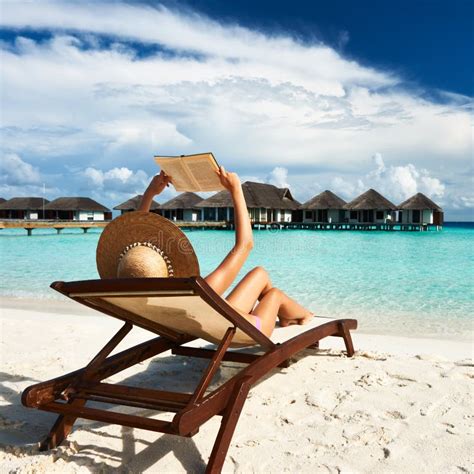 Young Woman Reading a Book at Beach Stock Image - Image of ocean, lifestyles: 29770795