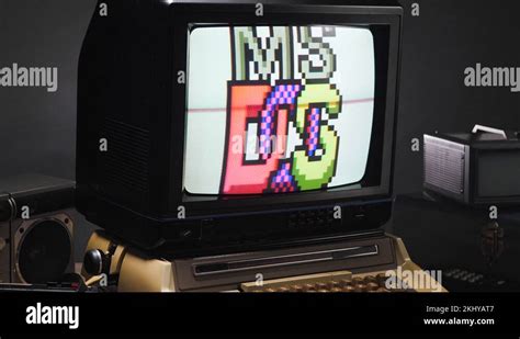 Vintage Computer With MS DOS Logo on the Old Monitor Stock Video Footage - Alamy