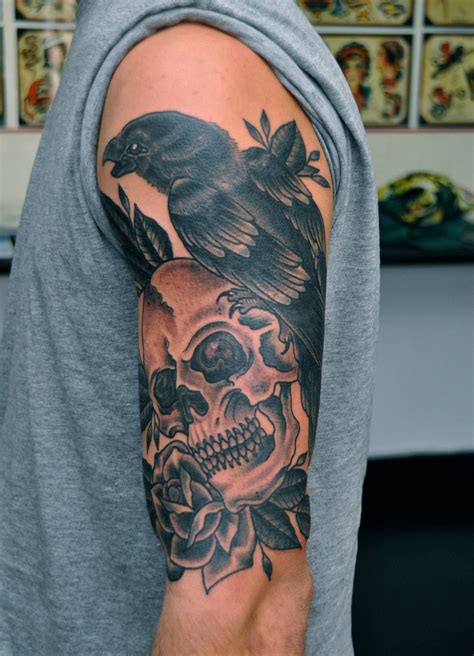 Traditional Skull and Raven Tattoo