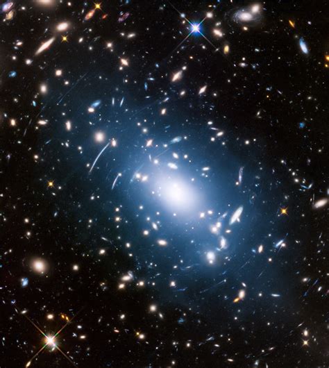 Faint glow within galaxy clusters illuminates dark matter - Window on ...